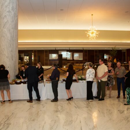 a group of people standing in a line