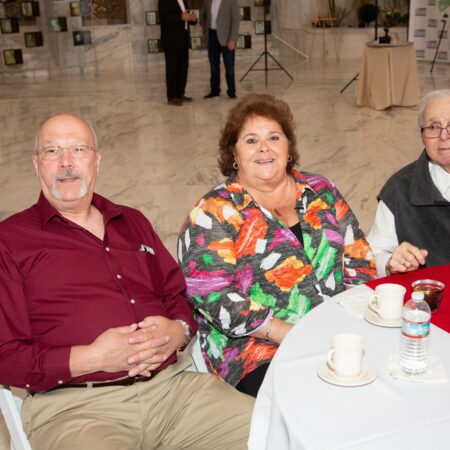 a group of people sitting at a table