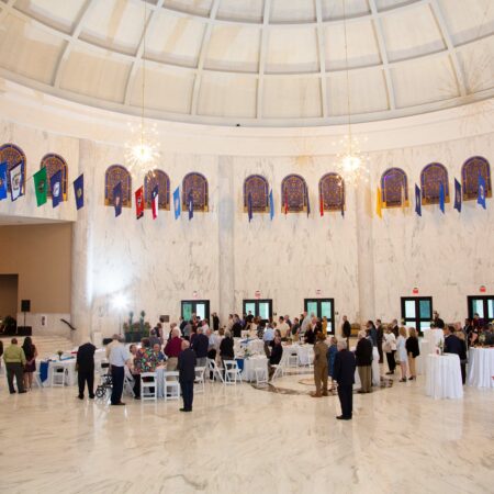 a group of people in a large room