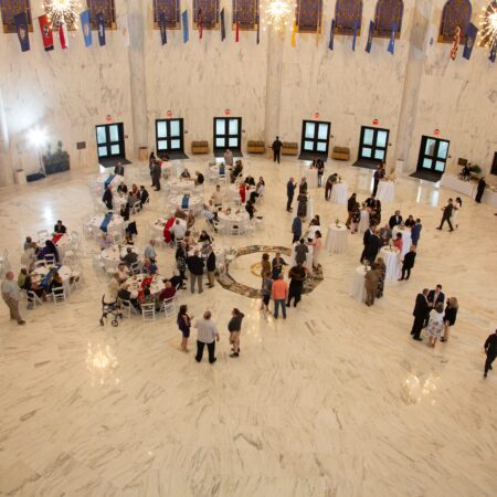 a group of people in a large room