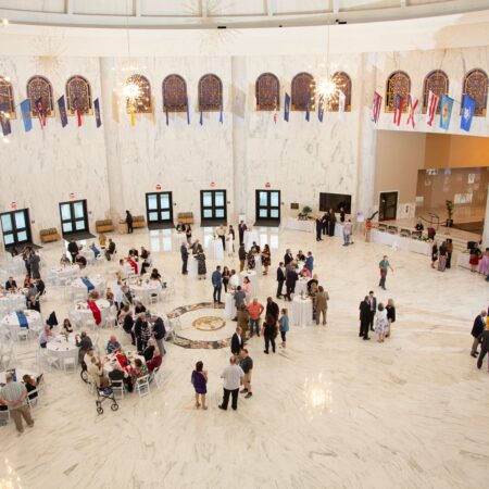 a group of people in a large room