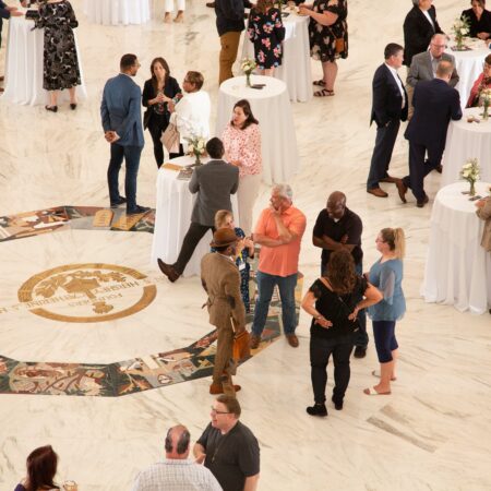 a group of people in a large room