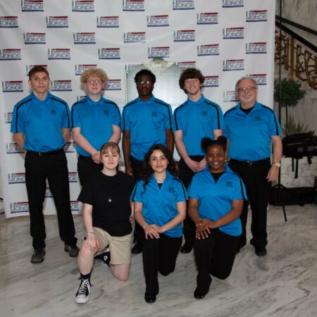 a group of people posing for a photo