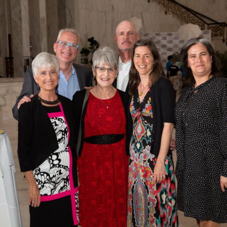 a group of people posing for a photo