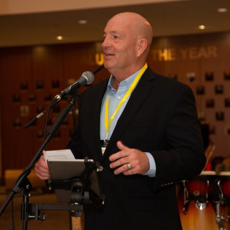 a person speaking into a microphone