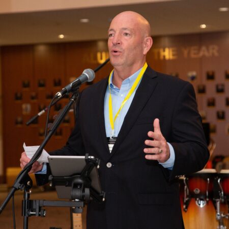 a person speaking into a microphone