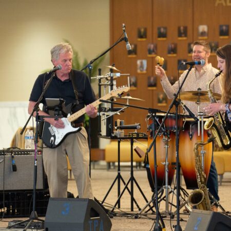 a group of people playing instruments