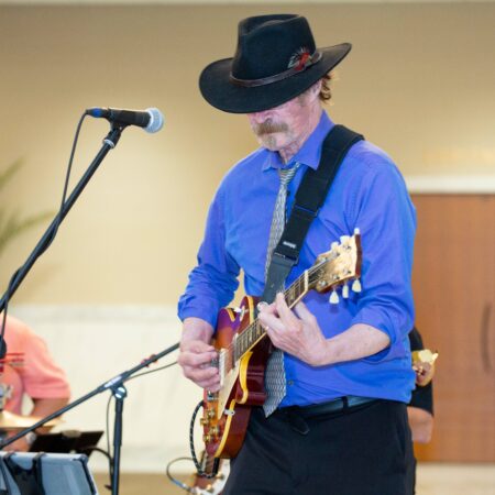 a person playing a guitar