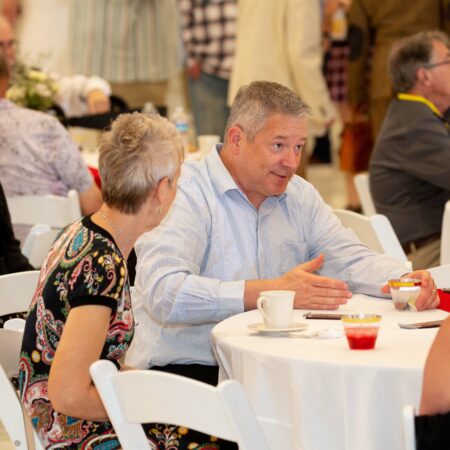 a group of people sitting at a table