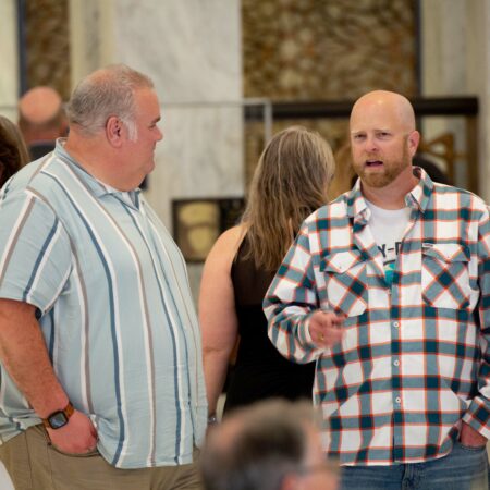 a group of men talking