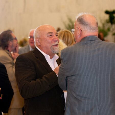 a group of men talking
