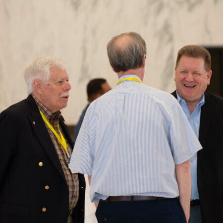 a group of men talking