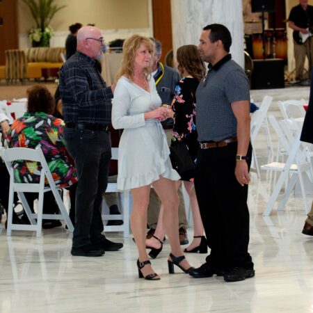a group of people standing in a room