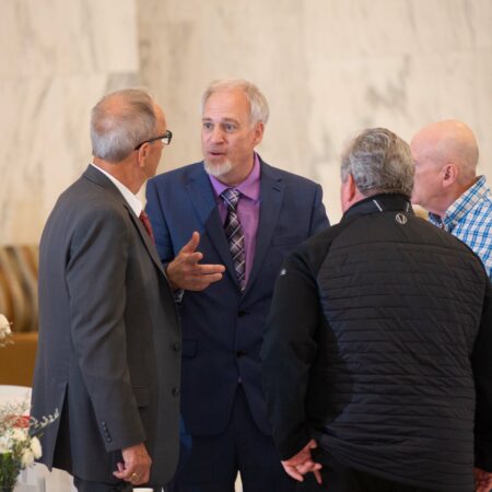 a group of men talking