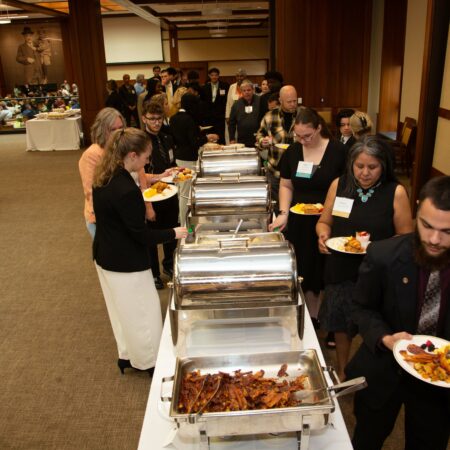 a group of people at a buffet
