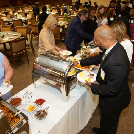 a group of people at a buffet