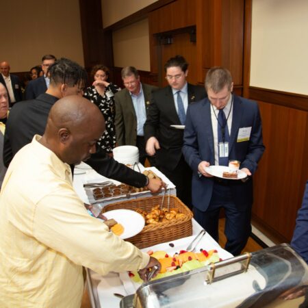 a group of people at a buffet