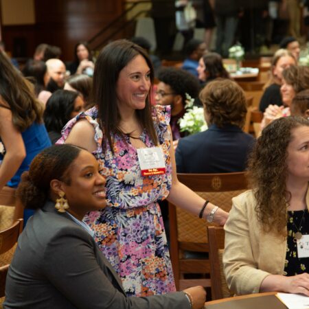a group of women sitting in chairs