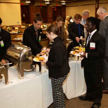 a group of people at a buffet