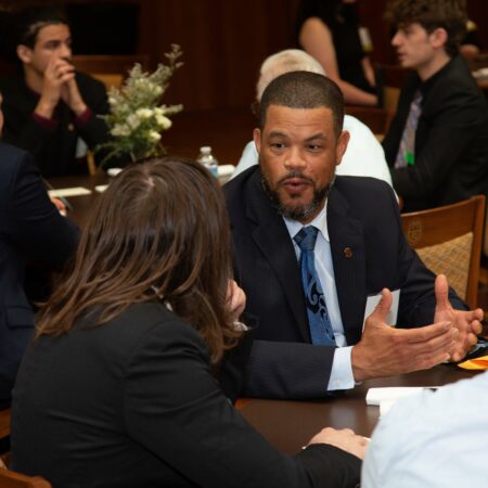 a group of people sitting at a table
