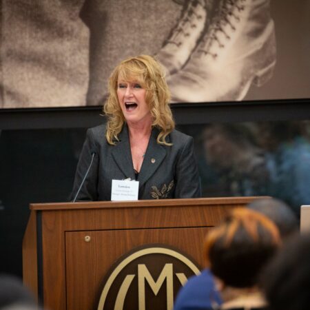 a person standing at a podium