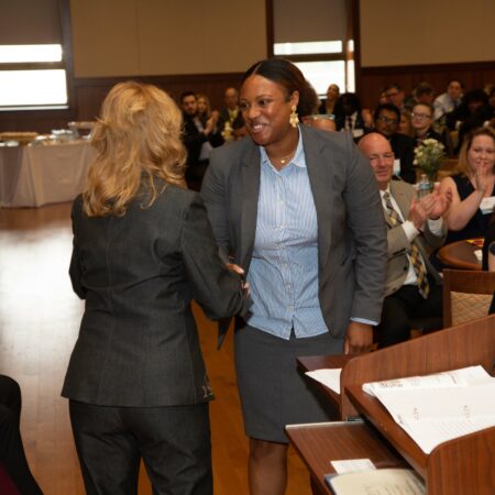 a group of people shaking hands