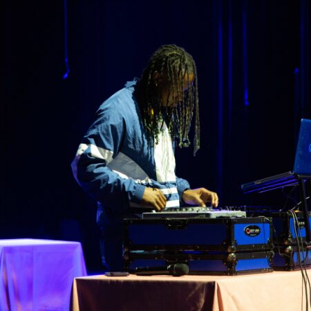 a person playing music on a stage