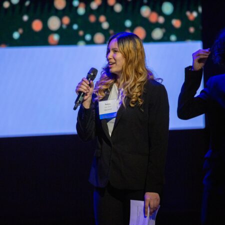 a person holding a microphone