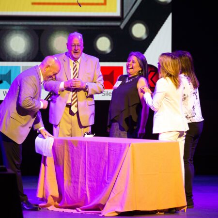 a group of people on a stage