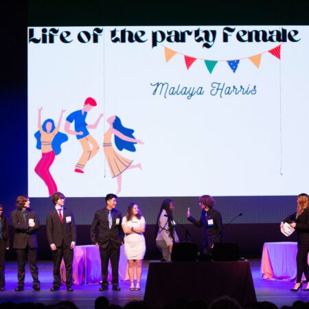 a group of people on a stage