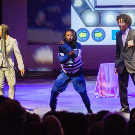 a group of people on a stage