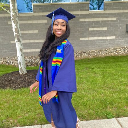 a person in a graduation cap and gown