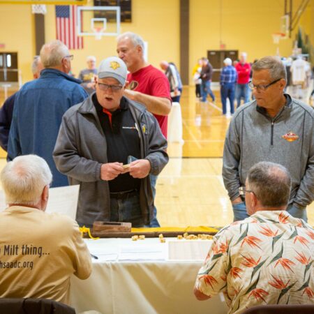 a group of men in a gym