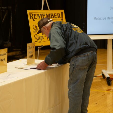 a person standing at a table