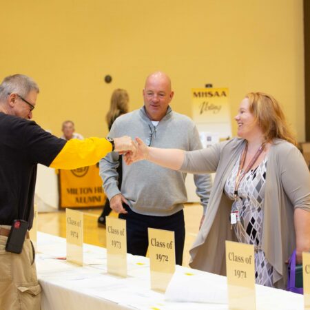 a person shaking hands with a person