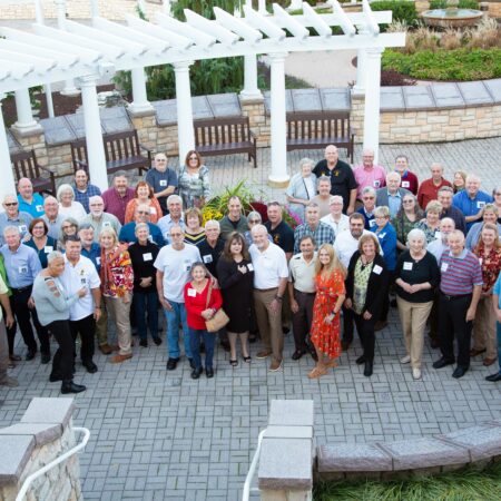 a group of people standing in a circle