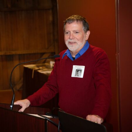 a person standing at a podium
