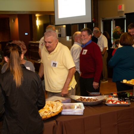 a group of people at a buffet
