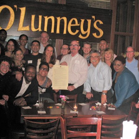 a group of people posing for a photo
