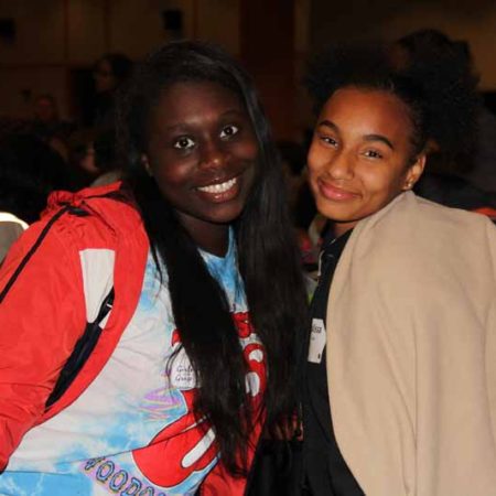 a couple of women smiling