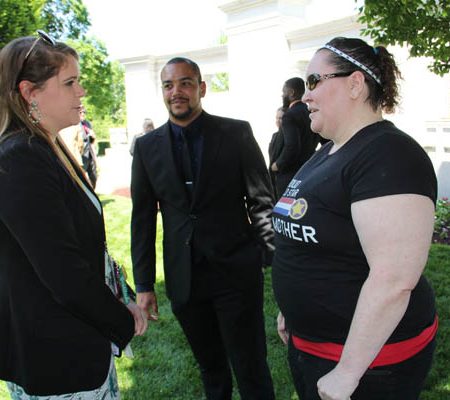 a group of people standing outside