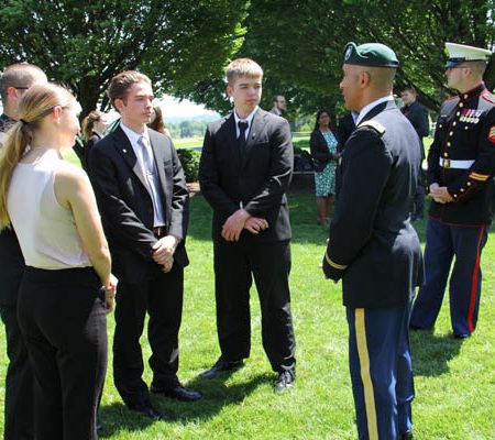 a group of people in formal attire
