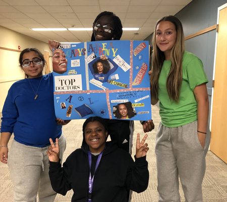 a group of people posing for a photo