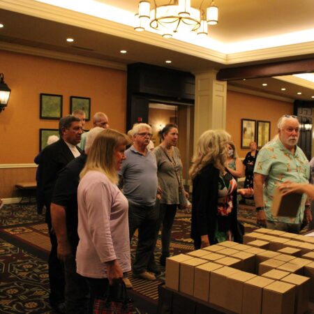 a group of people standing in a room