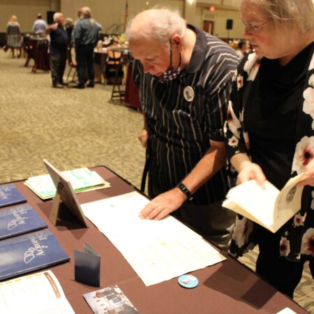 people looking at papers