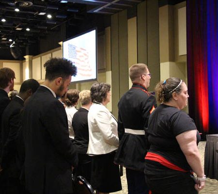 a group of people standing in a room