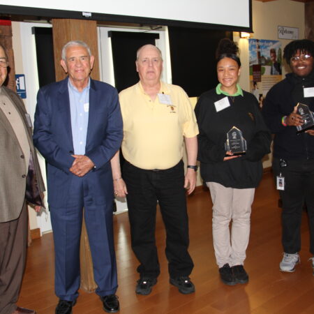 a group of people standing in a room