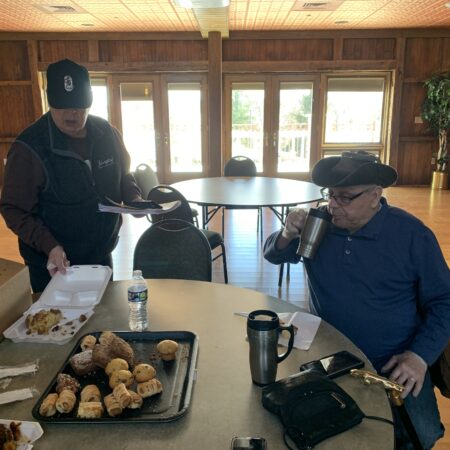 two men sitting at a table