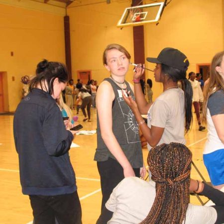 a group of people in a gym
