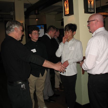 a group of people standing in a room